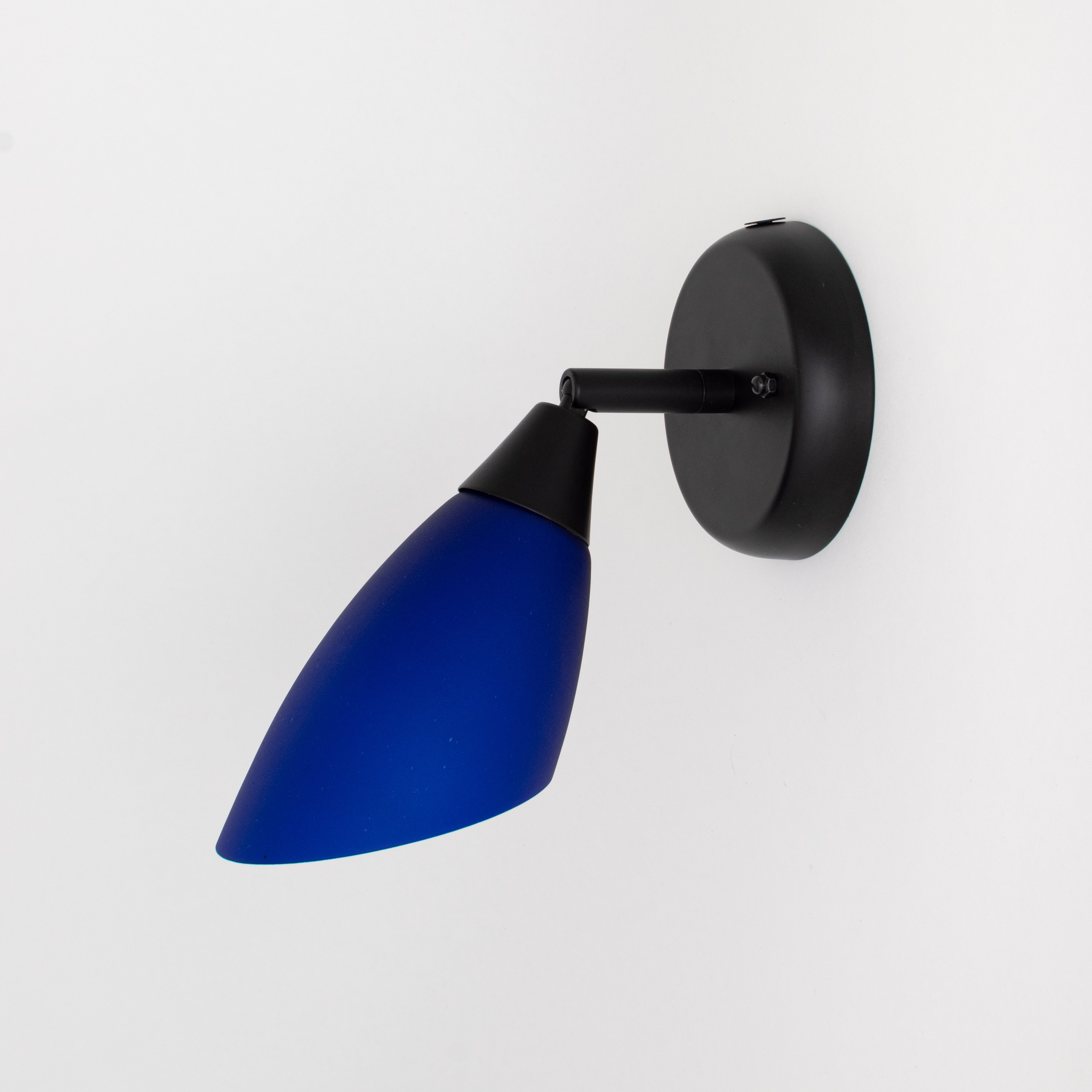 Black wall spotlight with hinge and blue glass shade