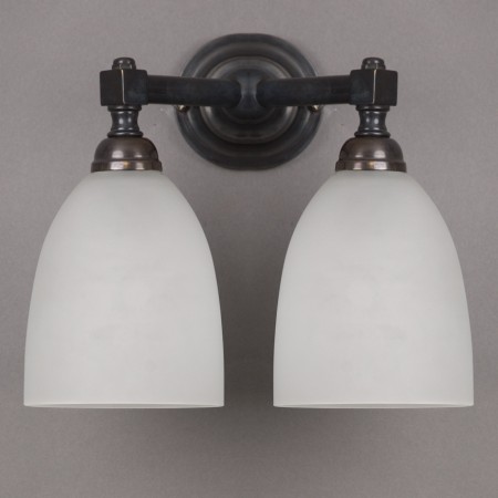 Bathroom wall lamp with etched glass shade and bronze finish
